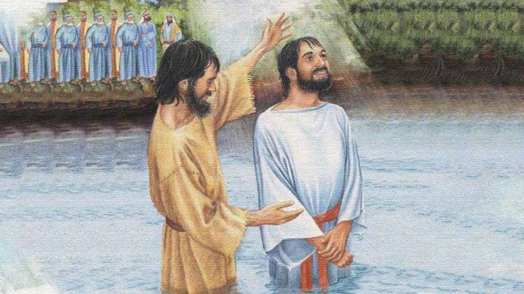 A man baptizing another man in a river.