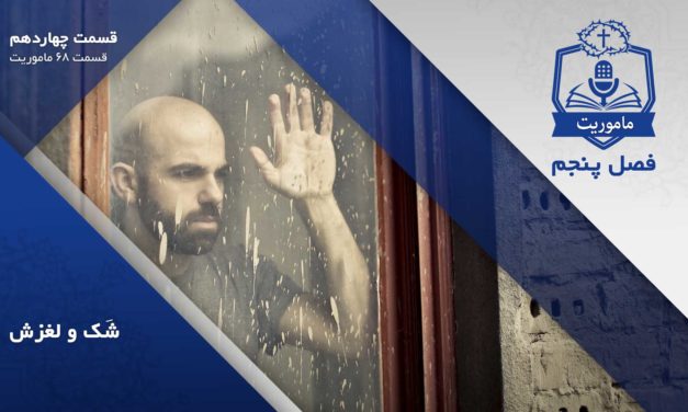 Man gazing pensively through a rain-speckled window.